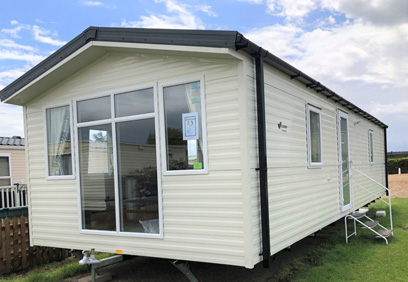 Static caravan sited at a holiday park