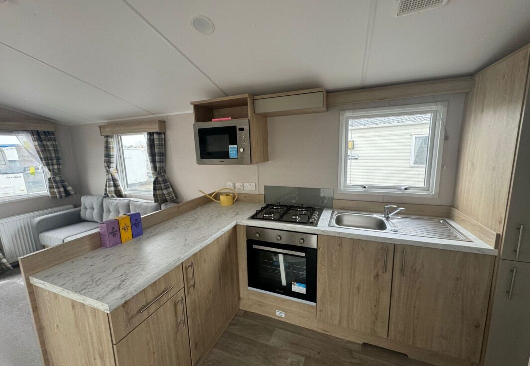 New Atlas Mirage 28x12 2 Bedroom static caravan kitchen breakfast bar