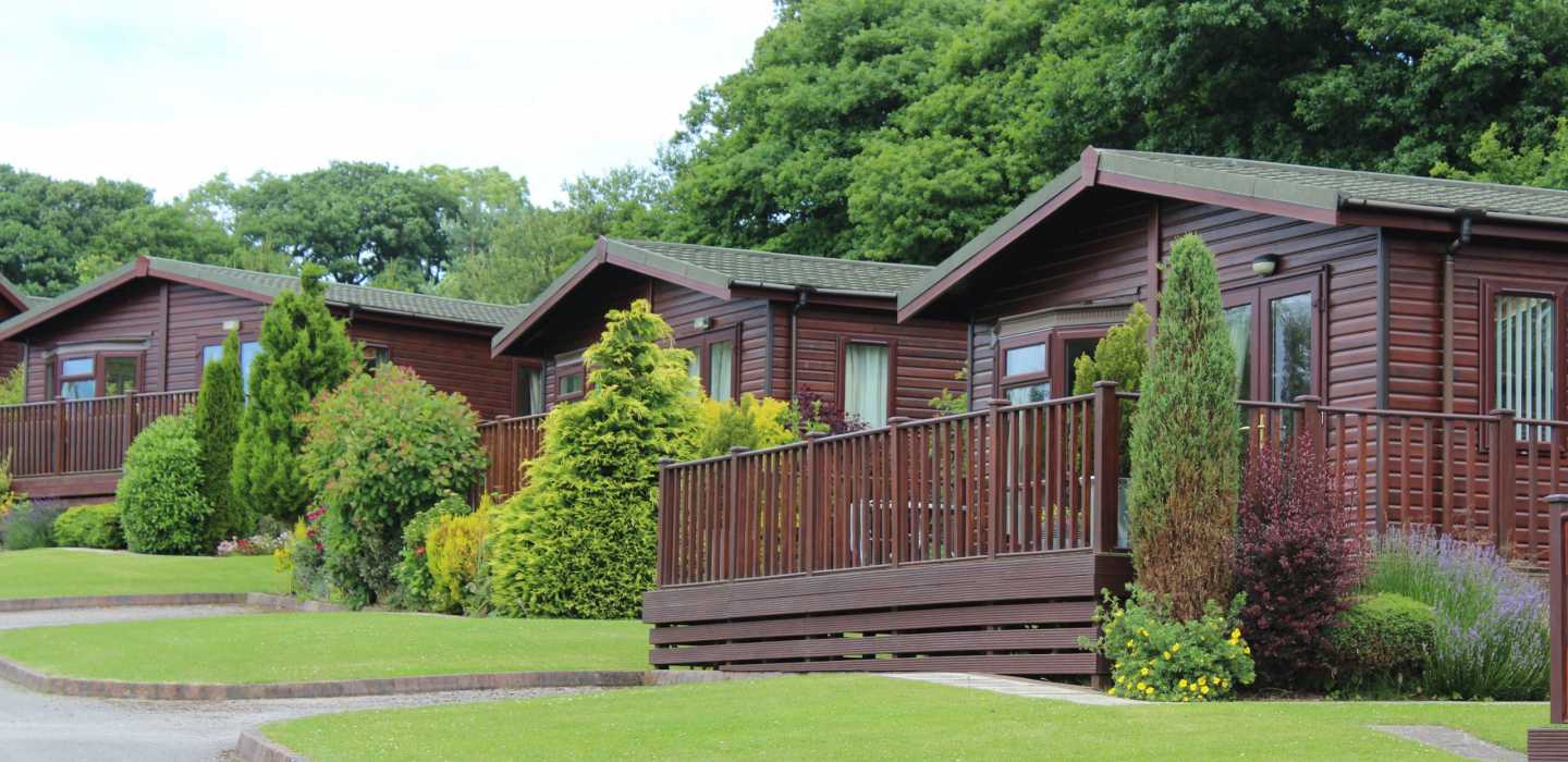 Lodge static caravan mobile home holiday park CanExel cladding environmental colour