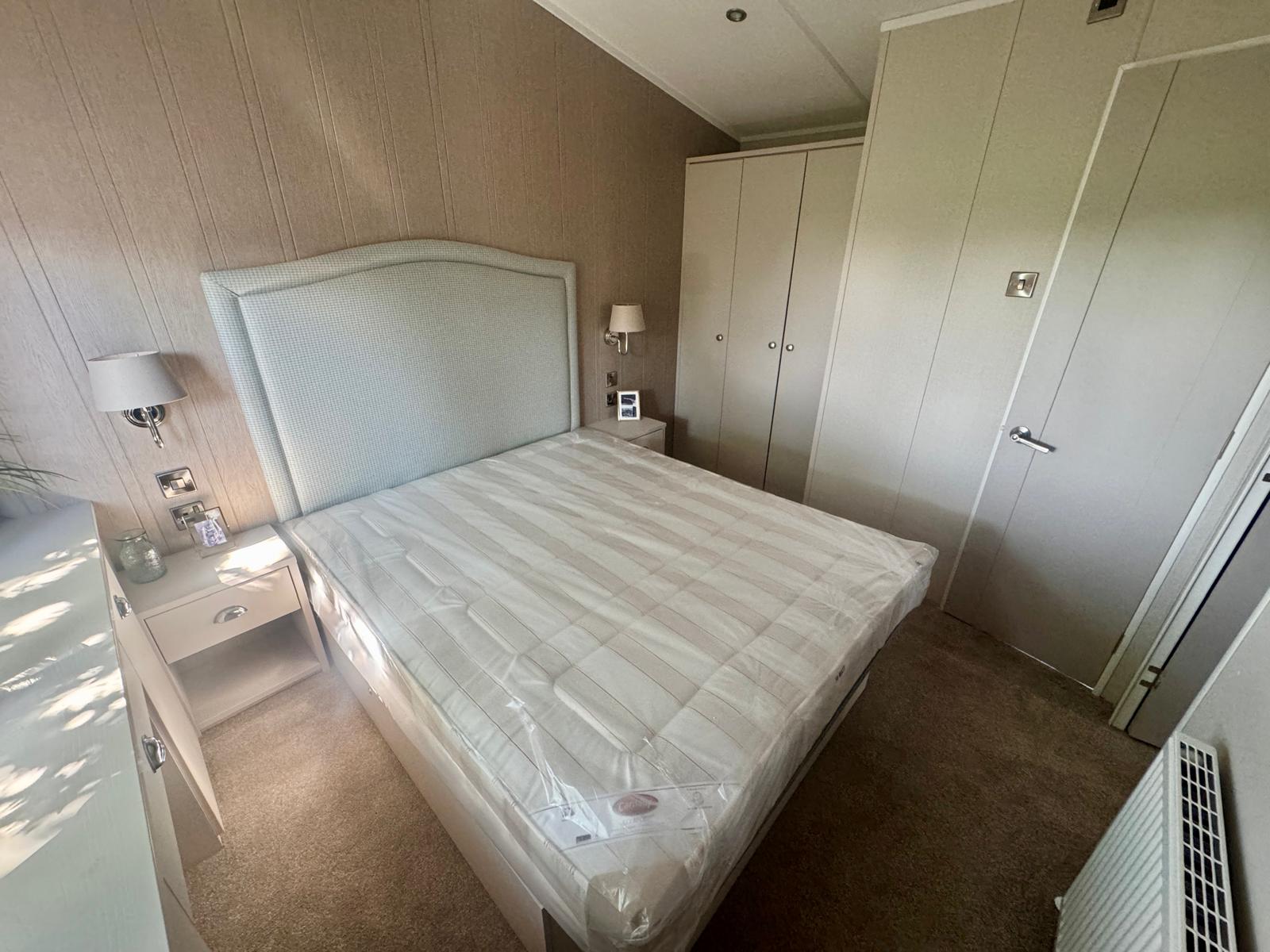 New Carnaby Lakehouse Lodge Static Caravan master bedroom