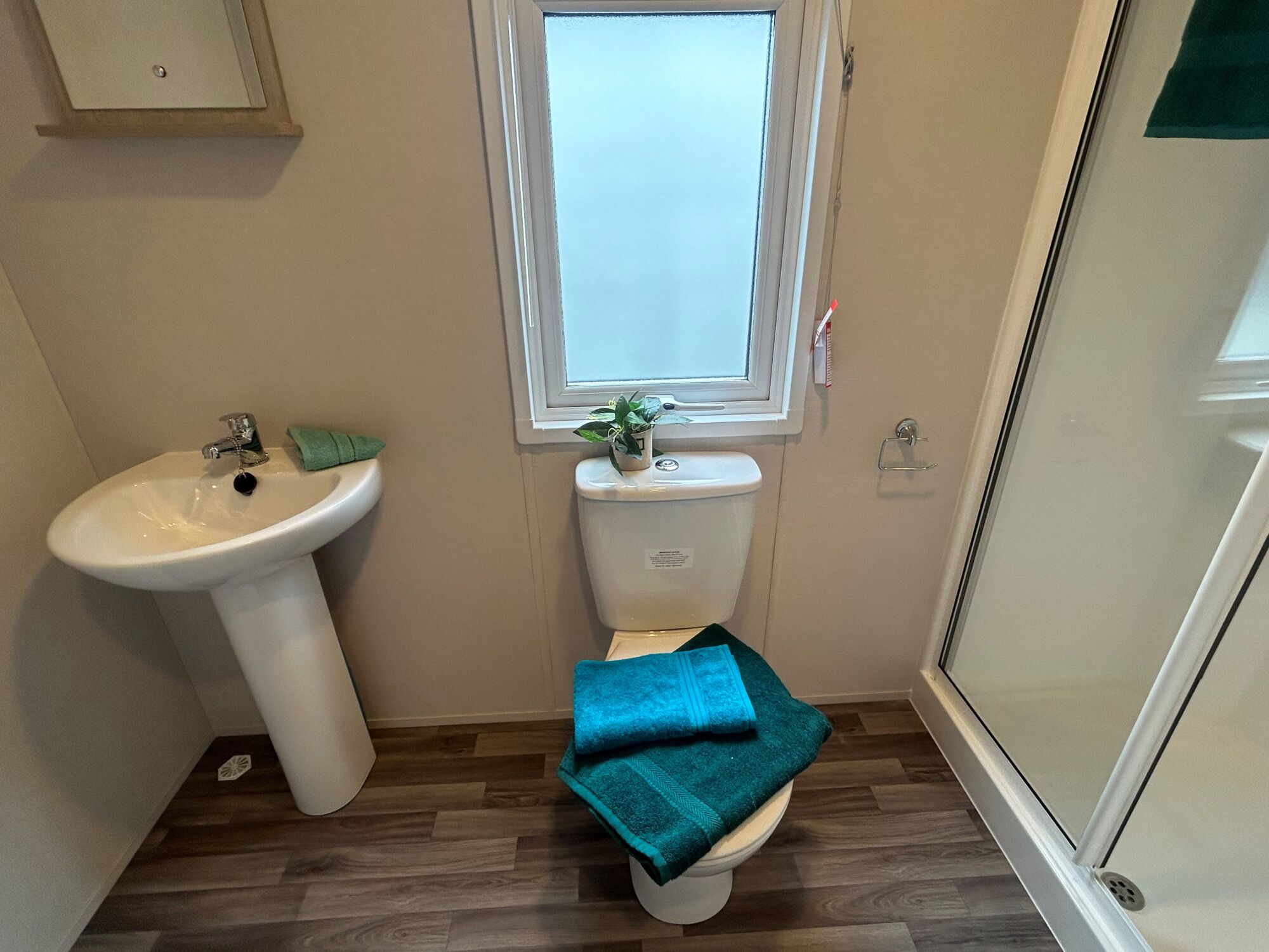 New Delta Saffron Deluxe Static Caravan bathroom