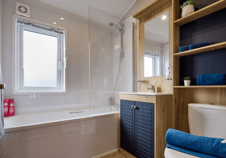 New Willerby New Holland lodge static caravan bathroom with a bath