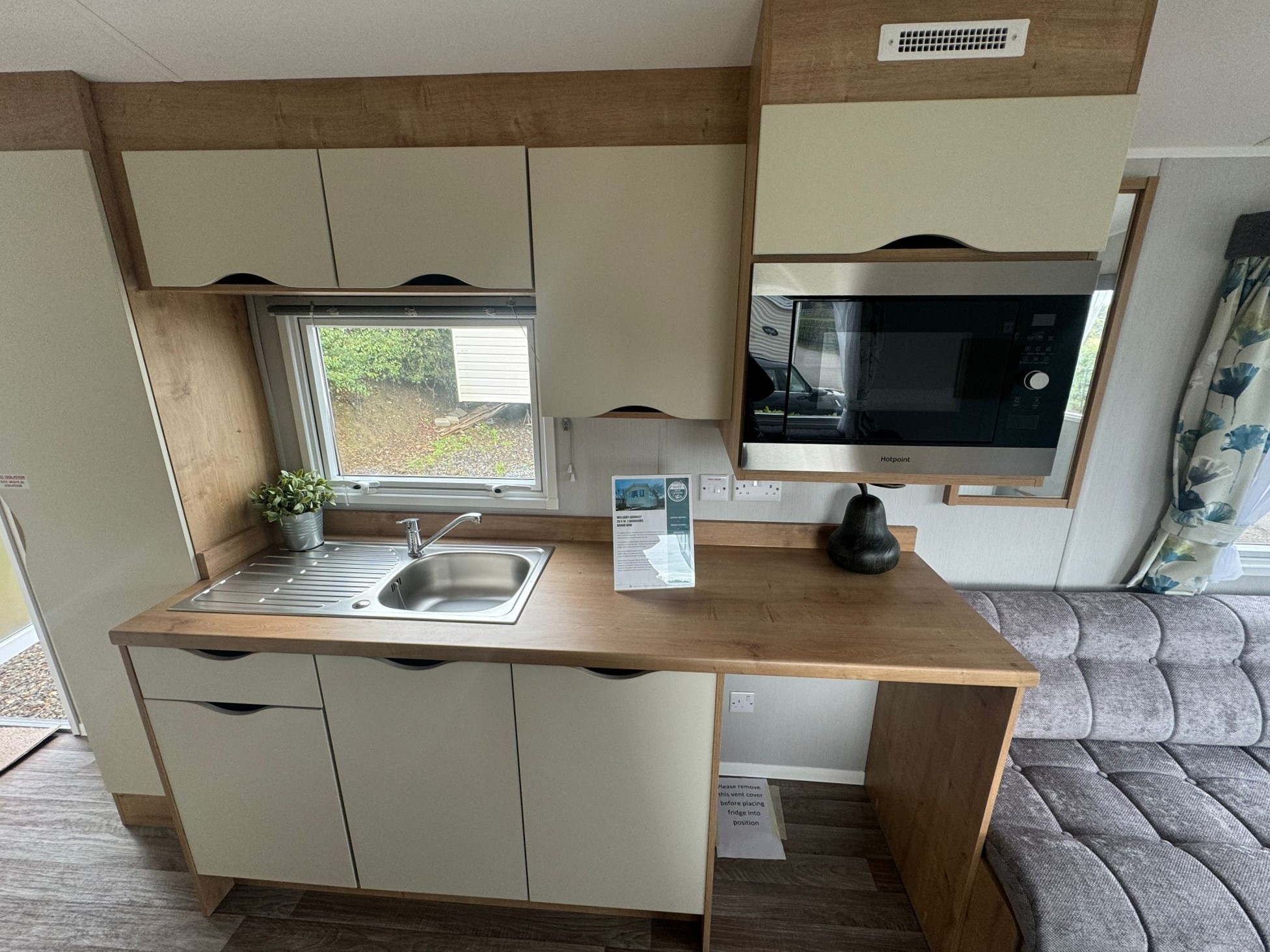 New Willerby Ashurst Static Caravan kitchen with integrated microwave