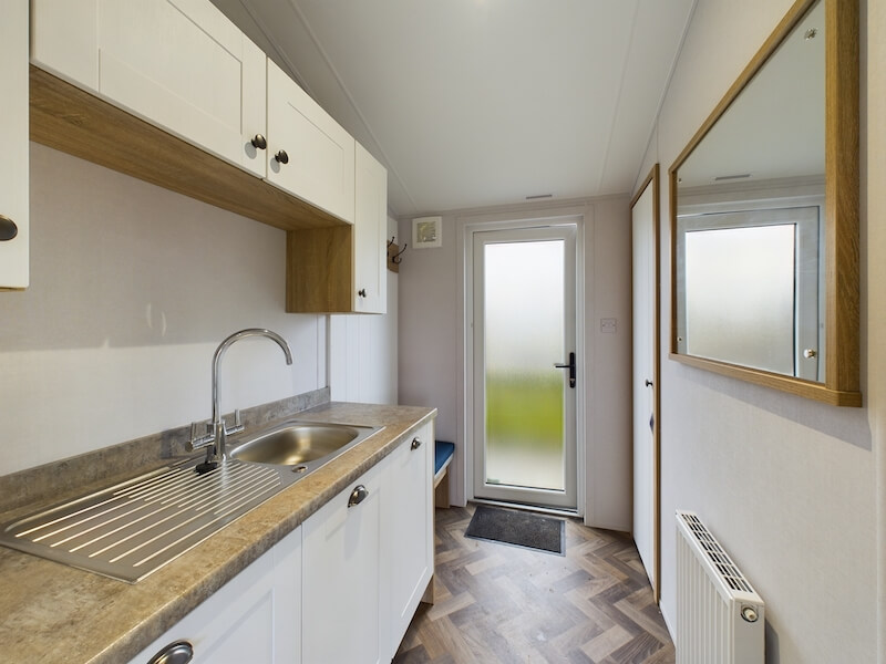 New Willerby Pinehurst twin lodge static caravan utility room