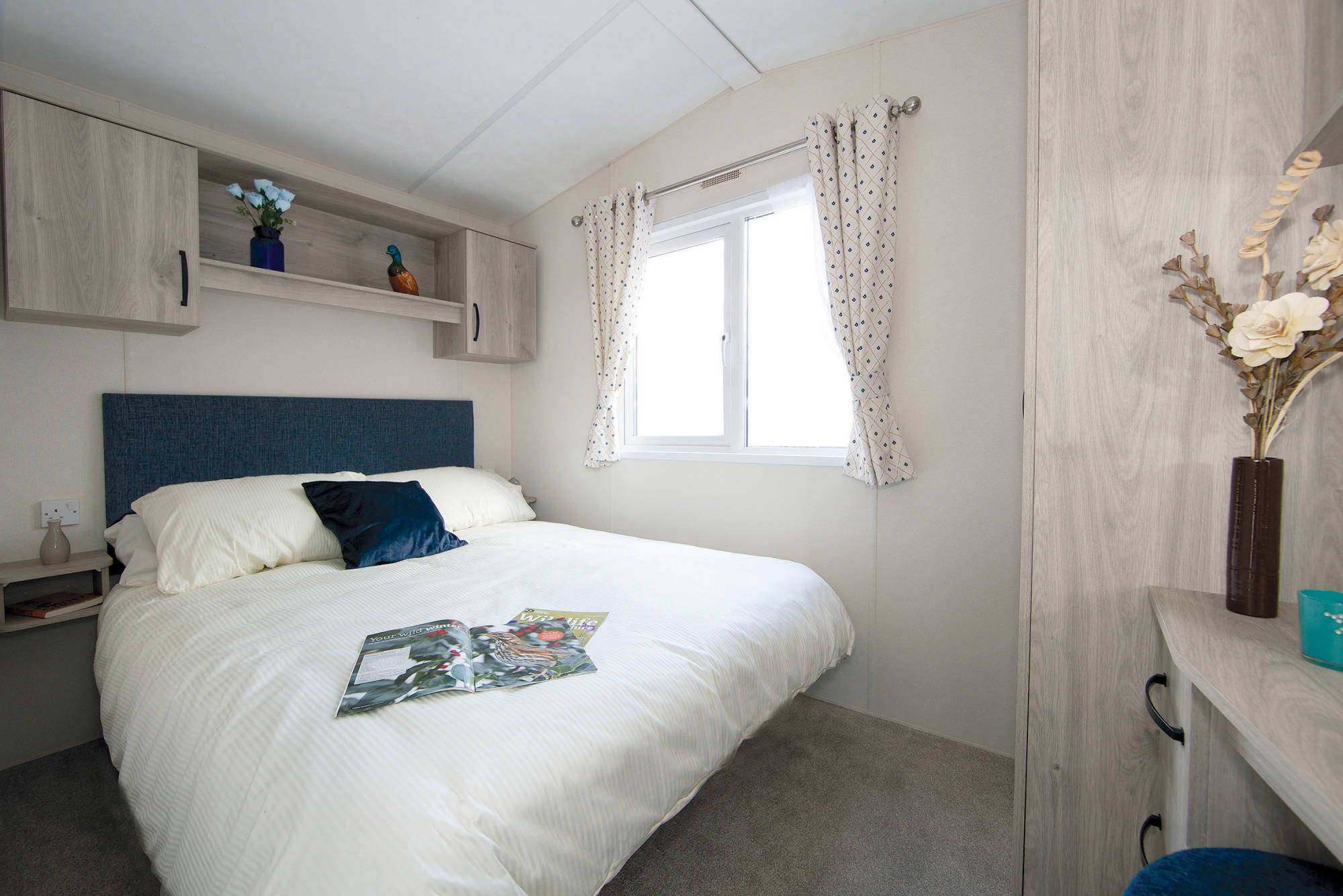 New Delta Avalon Static Caravan master bedroom