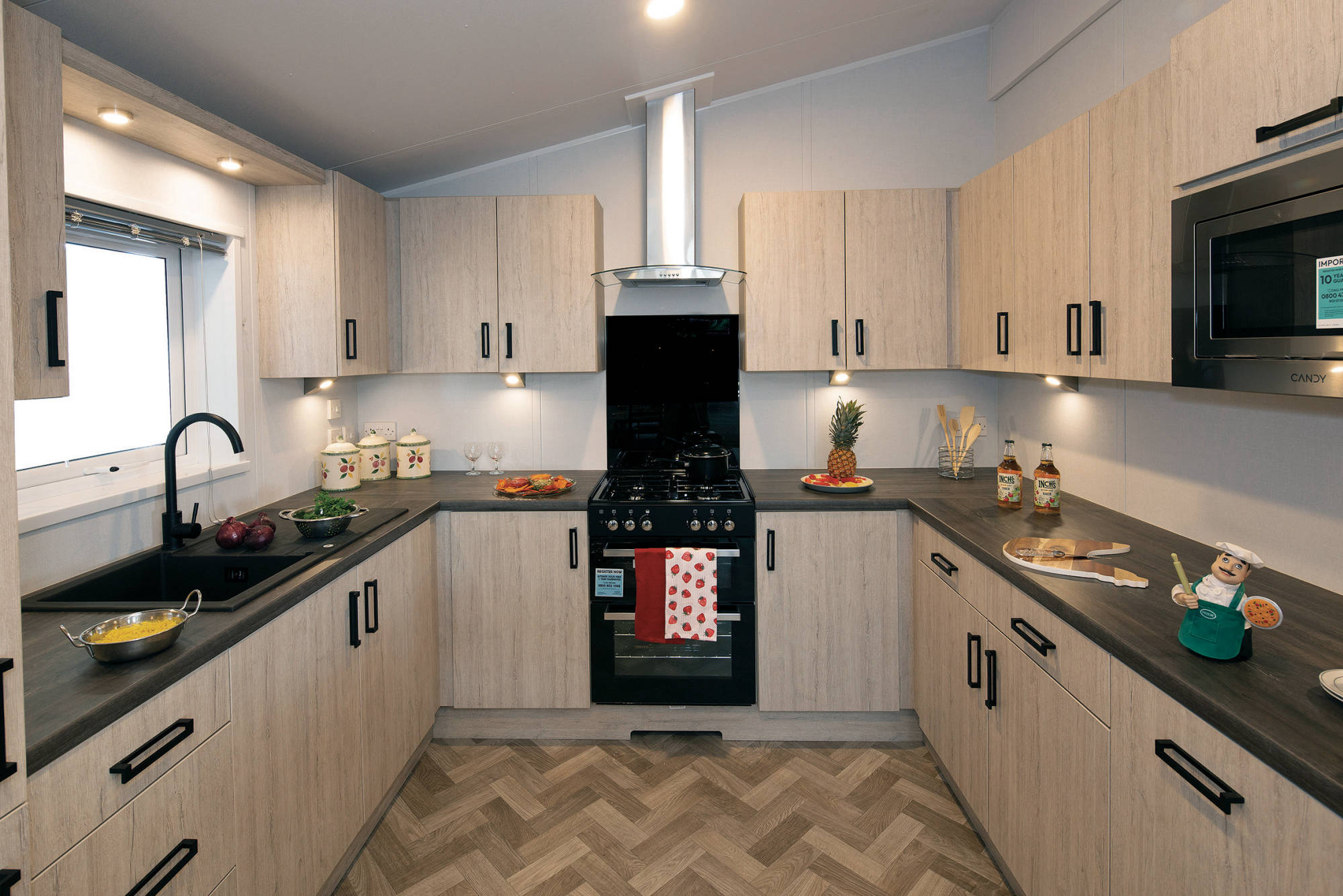 New Delta Newbury Static Caravan Residential Twin Lodge kitchen with integrated appliances