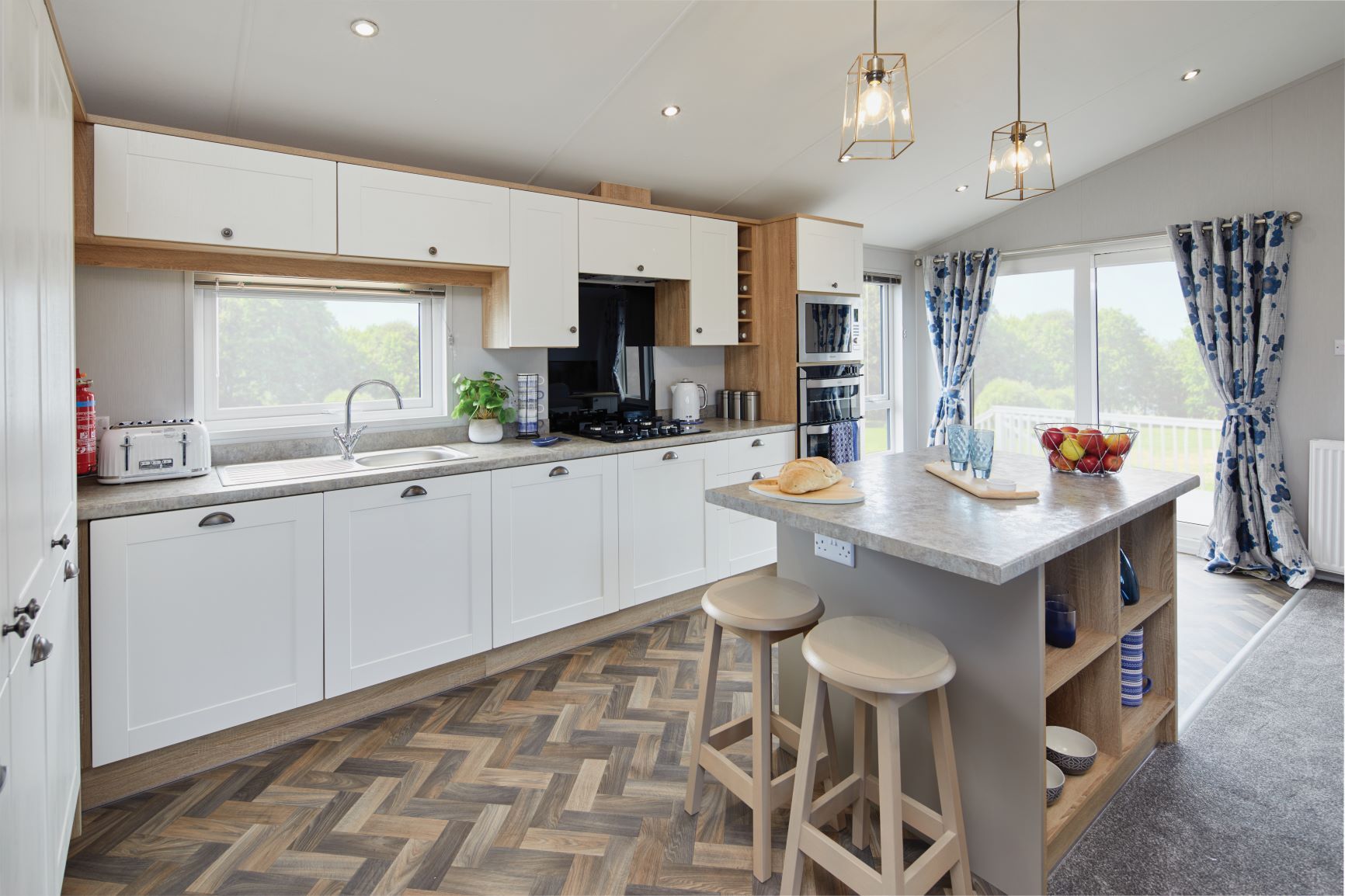 New Willerby Pinehurst twin lodge static caravan kitchen with breakfast bar