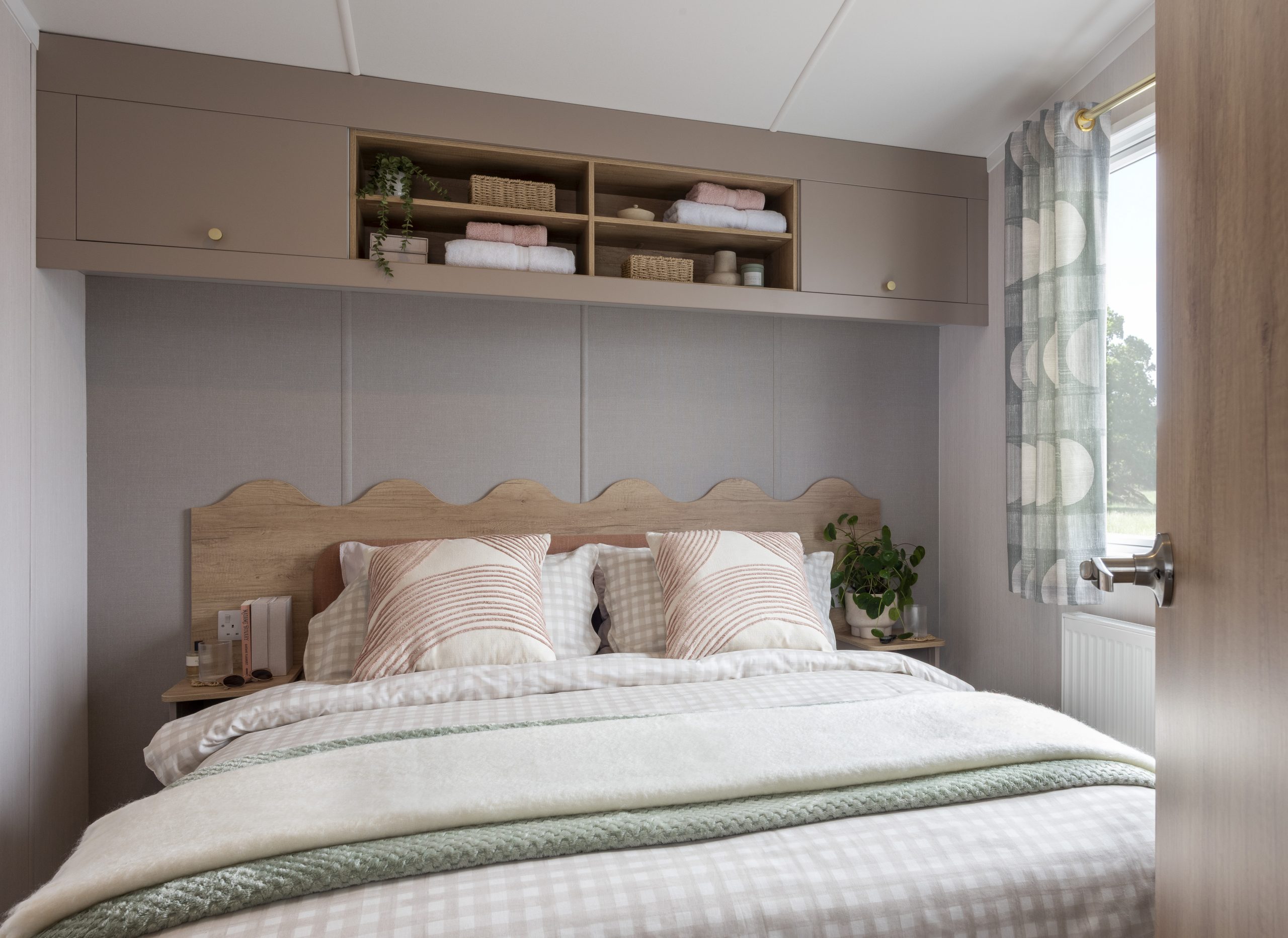 New Swift Burgundy Static Caravan master bedroom