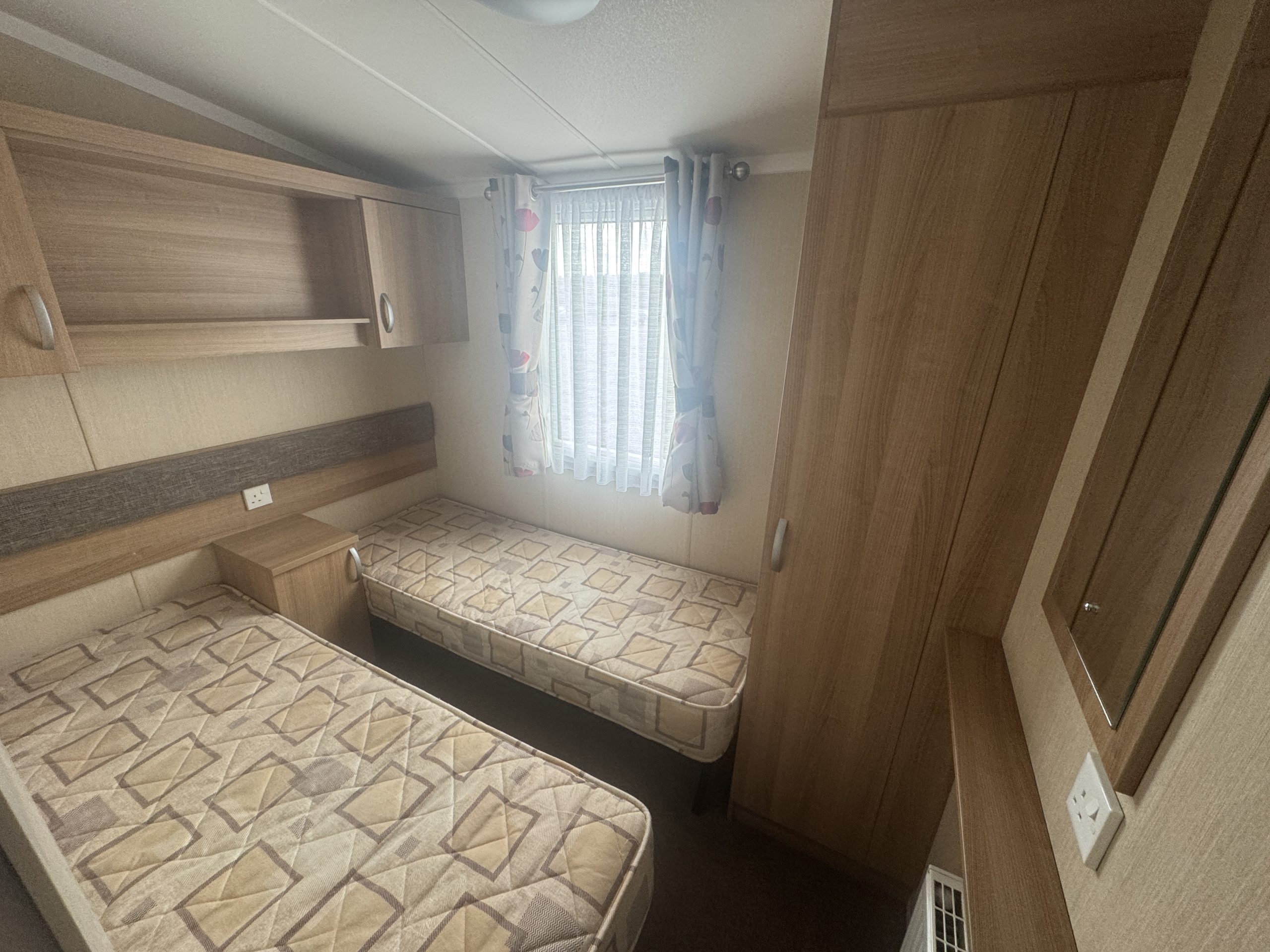 Preowned 2015 Swift Bordeaux 40x12 3 Bed Static Caravan twin bedroom