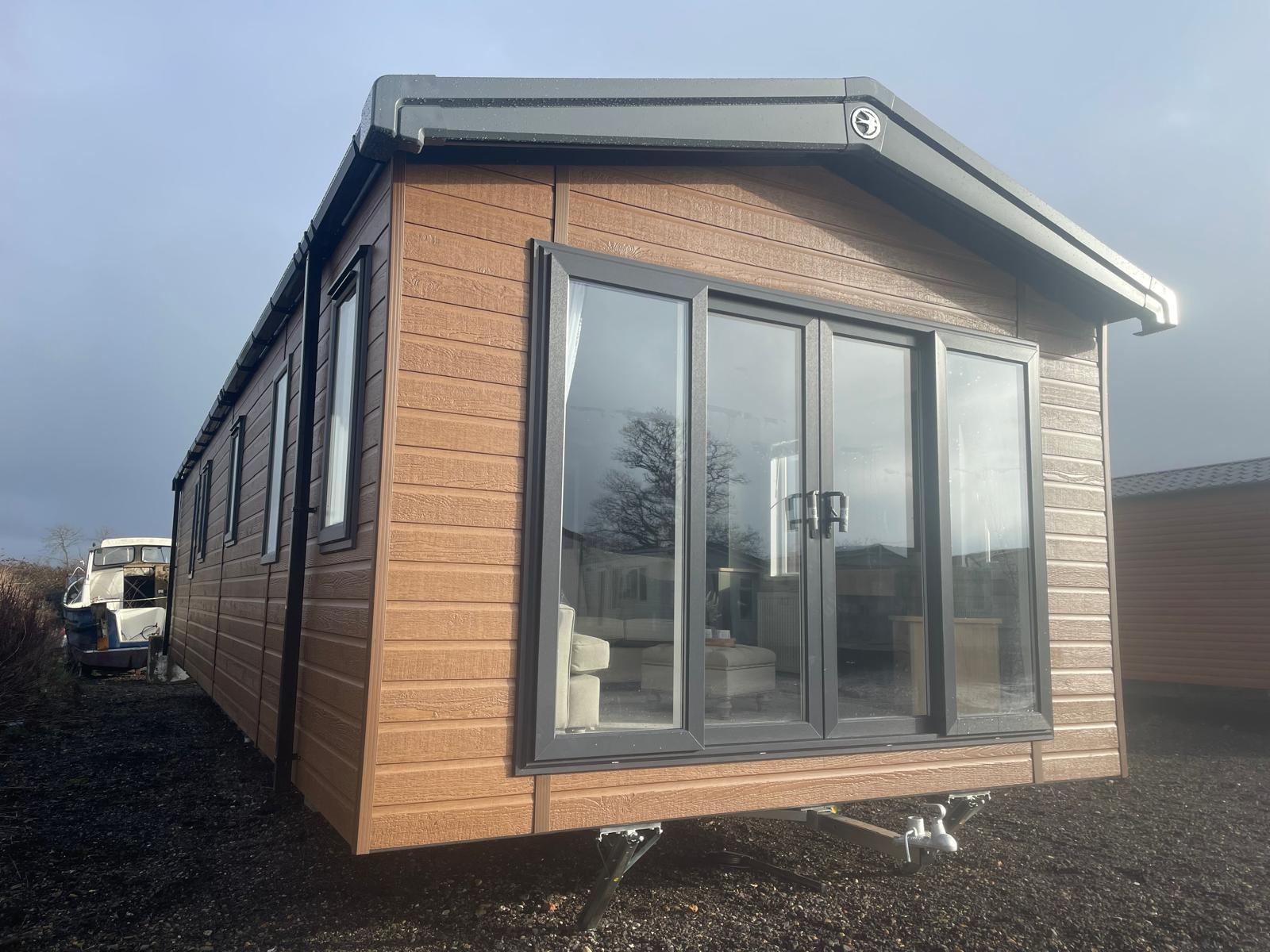 New Swift Vendee Lodge Static Caravan Residential Spec wood cladding