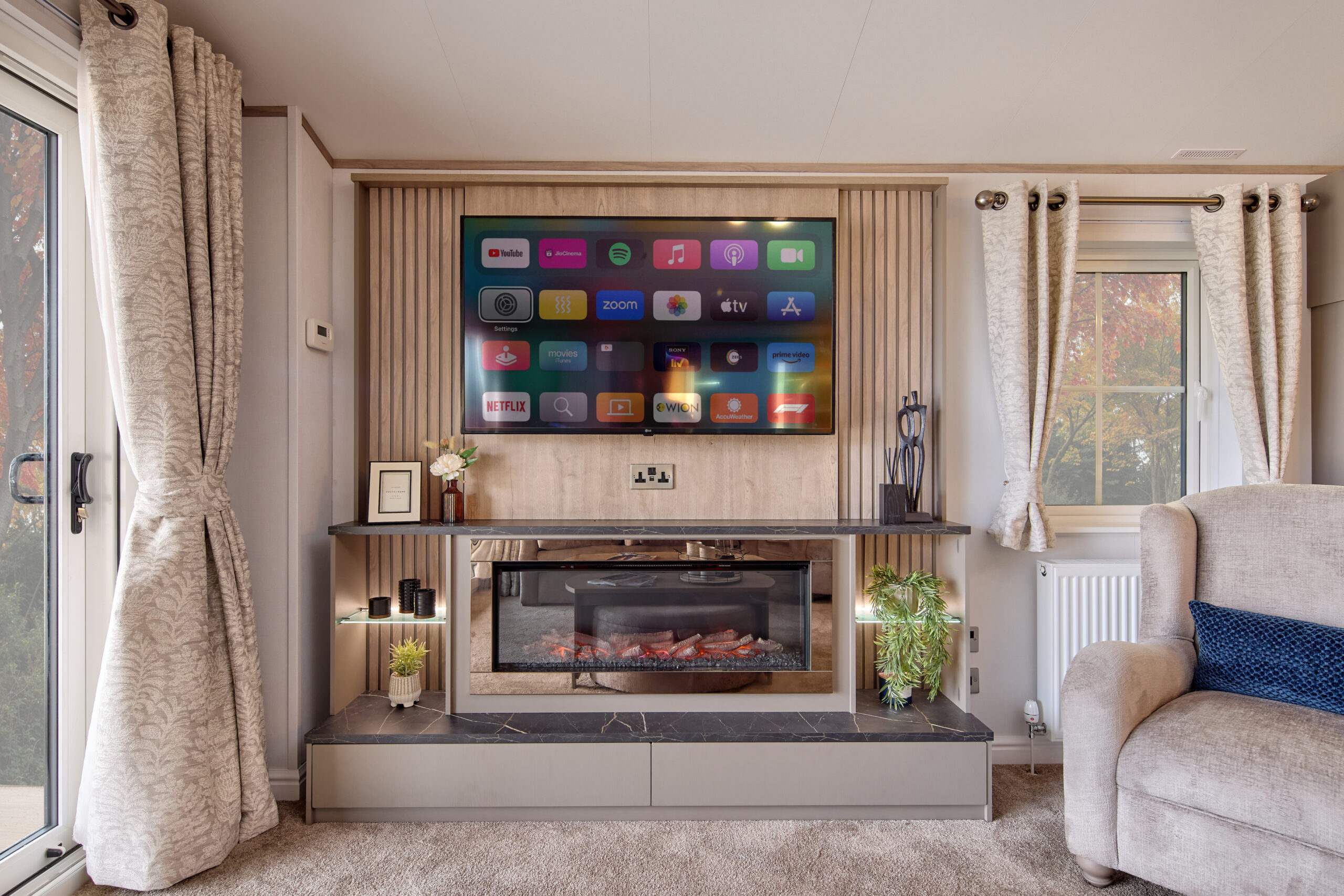 New Willerby Vogue static caravan media wall with fire