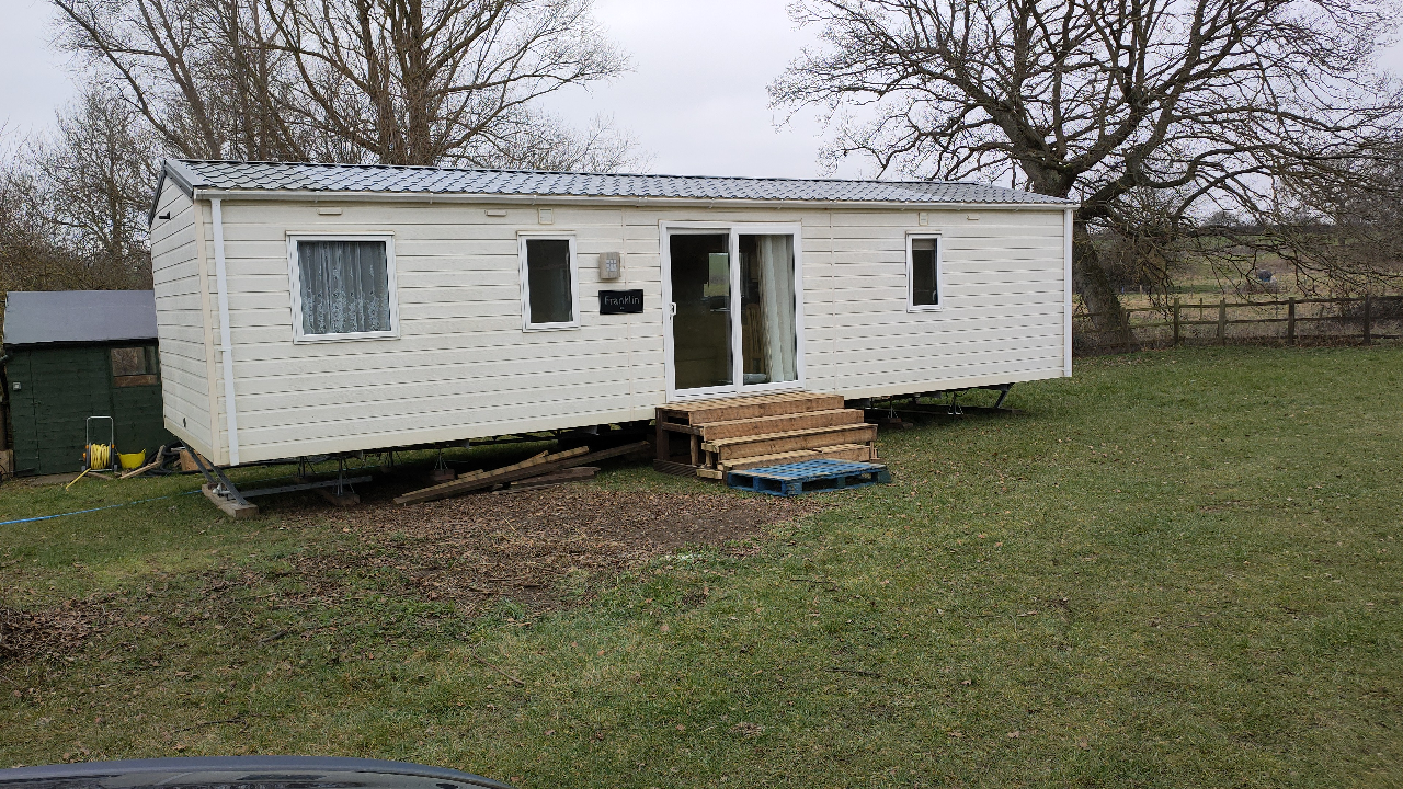 Can I Live in a Static Caravan or Lodge on My Own Agricultural Land?